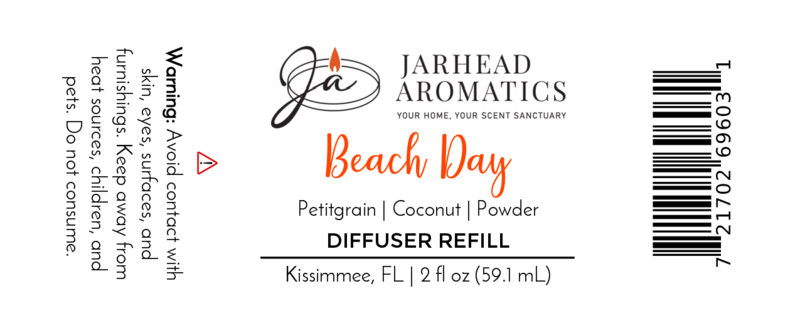A product label for the Beach Day Diffuser Refill | Coconut, Citrus & Cotton Blossom by Jarhead Aromatics, with a coastal scent. Includes fragrance notes, warning, barcode, and lists 2 fl oz (59.1 mL), made in Kissimmee, FL.