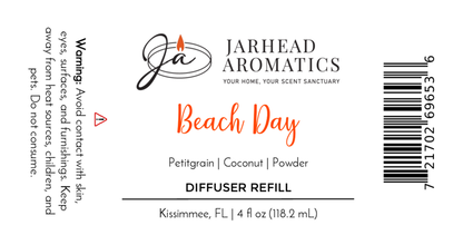 Jarhead Aromatics Beach Day Diffuser Refill label, orange & black text. Scent blend: coconut, citrus & cotton blossom. Warning on left to avoid contact. Net wt 4 fl oz. Barcode & Kissimmee, FL at bottom.