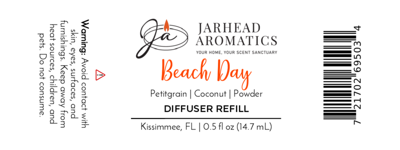 Jarhead Aromatics Beach Day Cold Air Diffuser Refill label showcases coastal citrus and coconut notes, a warning about furniture contact, barcode, and 0.5 fl oz (14.7 mL) size for a refreshing coastal home fragrance.
