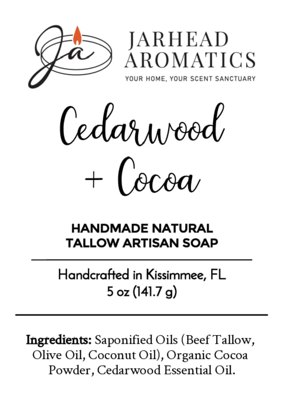Here is the revised sentence using the provided product data: A soap label for Jarhead Aromatics Cedarwood + Cocoa Handmade Natural Tallow Artisan Soap | Warm Cedarwood & Earthy Cocoa Soap, listing ingredients such as beef tallow, olive oil, coconut oil, cocoa powder, and cedarwood oil. This artisan soap is handcrafted in Kissimmee, FL. Net weight: 5 oz (141.7g).