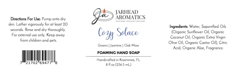 Product label for Cozy Solace Handmade Foaming Hand Soap | Fresh Greens, Jasmine, Oak Moss, listing ingredients, directions, barcode, and botanical fragrance notes of greens, jasmine, and oak moss.