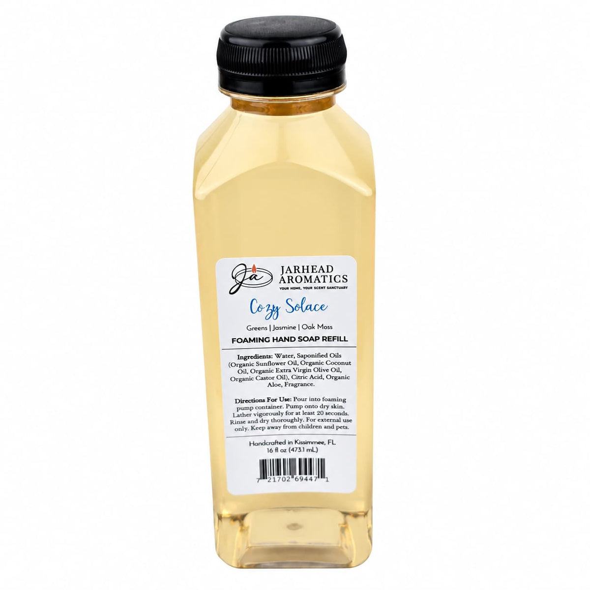 A plastic bottle of Cozy Solace Handmade Foaming Hand Soap with a black pump cap and a label detailing ingredients, directions, and product information.