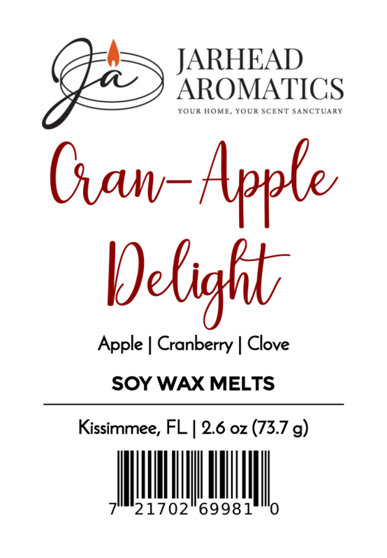 Label for Jarhead Aromatics Cran-Apple Delight Soy Wax Melt—fragrant cranberry apple spice blend. Includes logo, product info, 2.6 oz weight, Kissimmee, FL location, and barcode at the bottom.