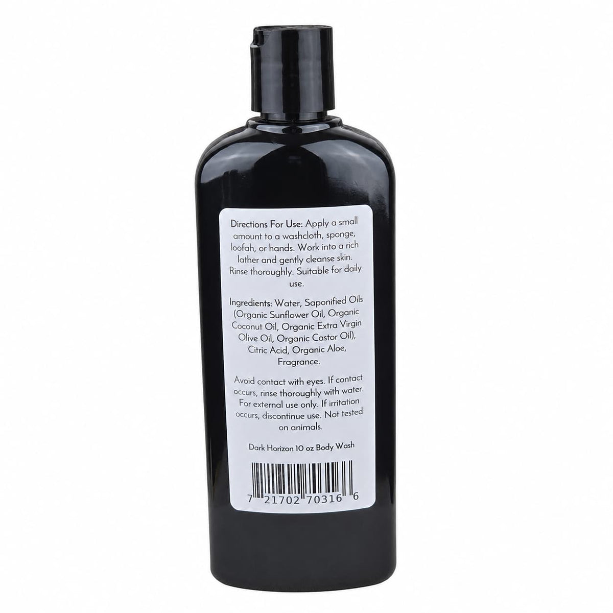 A sleek black bottle from Jarhead Aromatics displays the Dark Horizon Handmade Body Wash, featuring a white-on-black label with directions for use, ingredients, and a barcode at the bottom. This organic body wash is enriched with aloe and plant-based oils, infused with a masculine fragrance, and conveniently packaged with a flip-top cap.