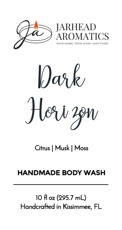 Label for Jarhead Aromatics Dark Horizon Handmade Body Wash, featuring a masculine scent of citrus, musk & moss. Made with organic aloe and plant-based oils. 10 fl oz. Handcrafted in Kissimmee, FL. Brand logo at top.