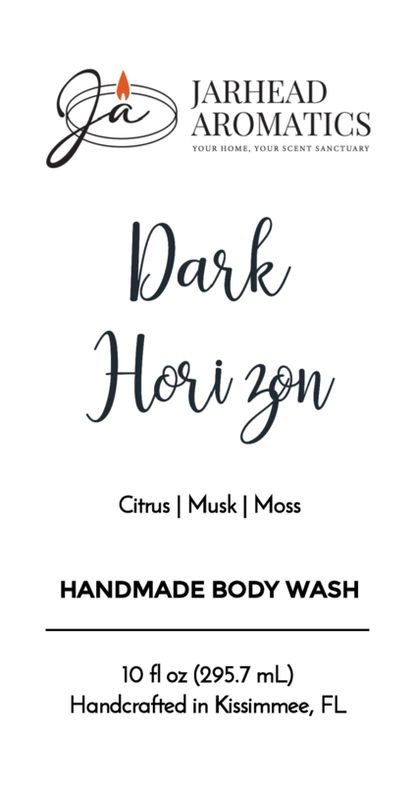 Label for Jarhead Aromatics Dark Horizon Handmade Body Wash, featuring a masculine scent of citrus, musk & moss. Made with organic aloe and plant-based oils. 10 fl oz. Handcrafted in Kissimmee, FL. Brand logo at top.
