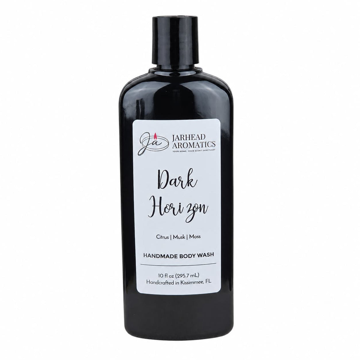 A 10 fl oz black bottle of Jarhead Aromatics Dark Horizon Handmade Body Wash, featuring a white label that highlights its citrus, musk, and moss scent notes. This moisturizing body wash is crafted with organic aloe and plant-based oils for a masculine fragrance in every handmade blend, and comes with a black cap.