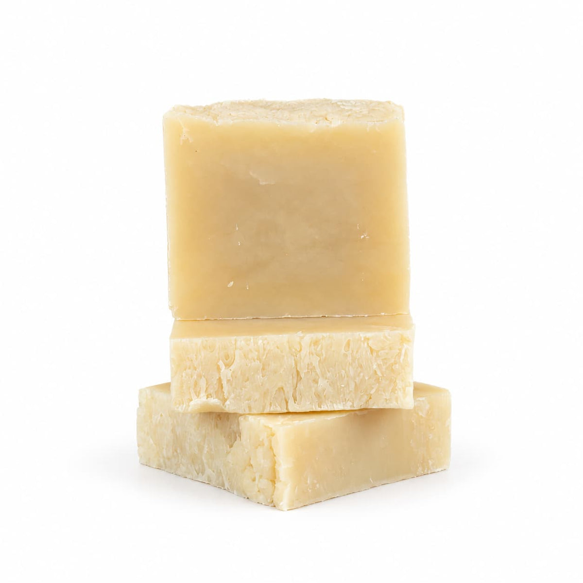Three rectangular bars of Jarhead Aromatics Eucalyptus + Rosemary Natural Handmade Soap stacked on top of each other.
