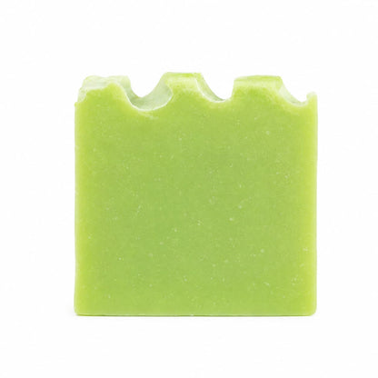 A rectangular bar of Jarhead Aromatics’ Eucalyptus + Spearmint Handmade Coconut Milk Artisan Soap, featuring three rounded peaks along the top edge, is displayed against a plain white background.