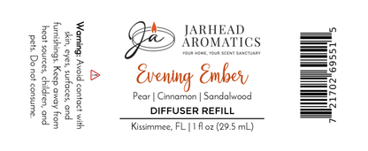 Jarhead Aromatics Evening Ember Car Diffuser Refill (plum, sandalwood & smoke), 1 fl oz. Features a comforting fragrance. Includes warning, barcode, and Kissimmee, FL. White background with black and orange text.