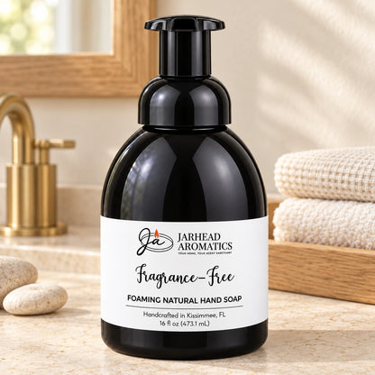 A black bottle of Jarhead Aromatics Fragrance-Free Handmade Foaming Natural Hand Soap with a label reading Fragrance-Free and Foaming Natural Hand Soap.