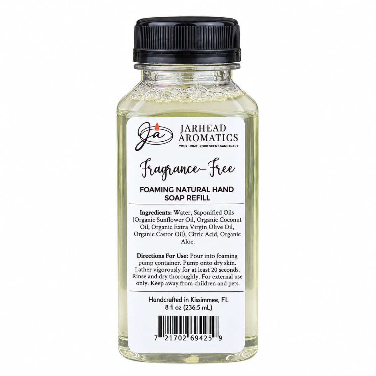 A clear plastic bottle of Jarhead Aromatics Fragrance-Free Handmade Foaming Natural Hand Soap, featuring a black cap and a white label listing ingredients, directions, and a barcode.