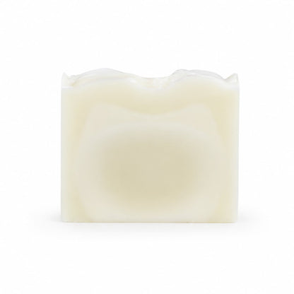 A rectangular, off-white bar of Fragrance-Free Handmade Natural Tallow Artisan Soap by Jarhead Aromatics, featuring a slightly wavy top and photographed against a plain white background.