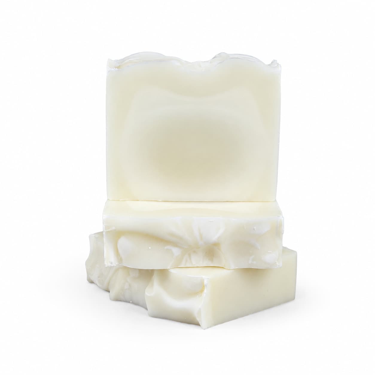 Three bars of Jarhead Aromatics Fragrance-Free Handmade Natural Tallow Artisan Soap are stacked vertically against a plain white background, with two unscented, minimal-ingredient tallow soap bars resting on top of a third. Each bar features smooth surfaces and gently wavy, textured edges.