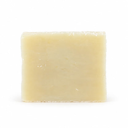 A rectangular bar of Jarhead Aromatics Fragrance-Free Natural Handmade Soap, featuring a cream-colored, unscented shea butter formula.