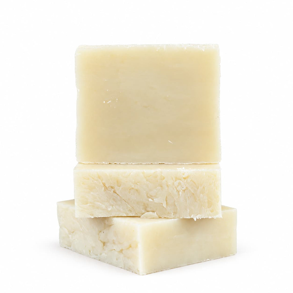 Three bars of Jarhead Aromatics Fragrance-Free Natural Handmade Soap stacked on top of each other.