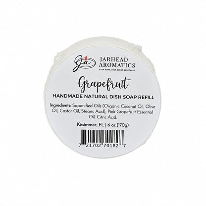 Grapefruit Handmade Natural Solid Dish Soap by Jarhead Aromatics—this round, 6 oz (170g) solid kitchen cleaning bar is labeled “Grapefruit” and made in Kissimmee, FL. The packaging shows ingredients and a barcode, and the text highlights that it’s a handmade dish soap crafted with plant-based ingredients and grapefruit essential oil.