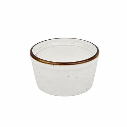 A small white ceramic ramekin with a subtle brown-tinted rim, shown against a plain white background—perfect for displaying Jarhead Aromatics' Lemon Handmade Natural Solid Dish Soap, a citrus kitchen cleaning bar with lemon essential oil.