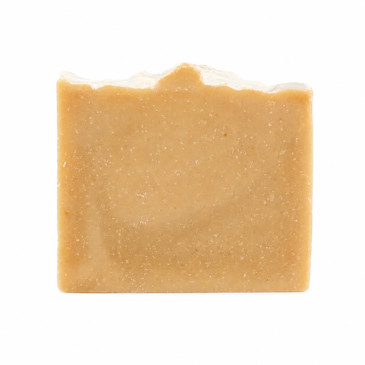 A rectangular, beige-colored bar of IPA + Pine Handmade Craft Beer Artisan Soap by Jarhead Aromatics, featuring a slightly uneven top edge and set against a plain white background.