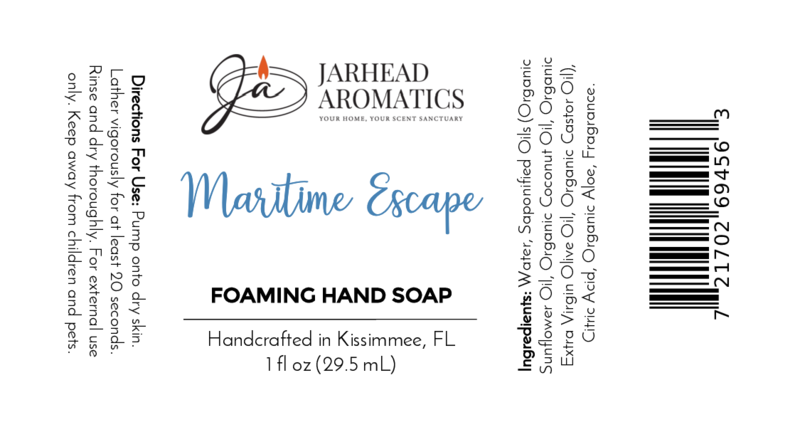 Jarhead Aromatics Maritime Escape Foaming Hand Soap label, 1 fl oz: white with blue/black text and orange logo, includes directions, ingredients, and barcode.