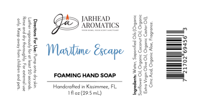 Jarhead Aromatics Maritime Escape Foaming Hand Soap label, 1 fl oz: white with blue/black text and orange logo, includes directions, ingredients, and barcode.