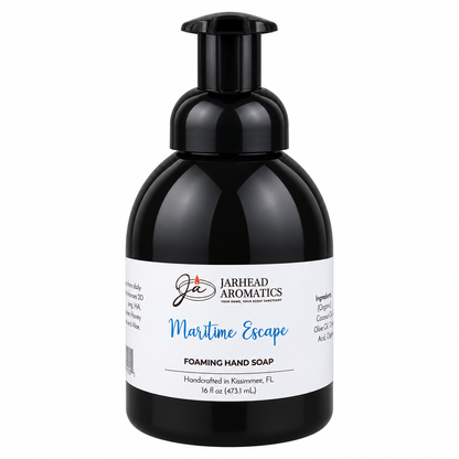 Black bottle of Maritime Escape Handmade Foaming Hand Soap | Ozone, Sea Salt & Violet with a pump dispenser and a white label featuring the product name and ingredient information.