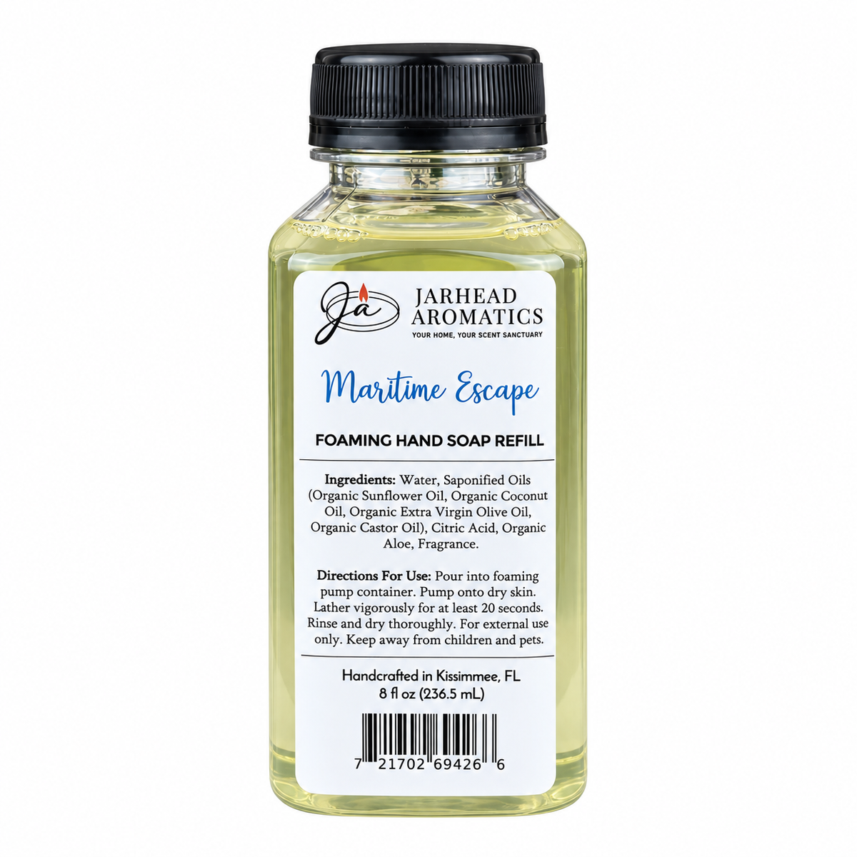 A clear plastic bottle of Maritime Escape Handmade Foaming Hand Soap | Ozone, Sea Salt & Violet refill with a black cap and a white label detailing ingredients and directions.