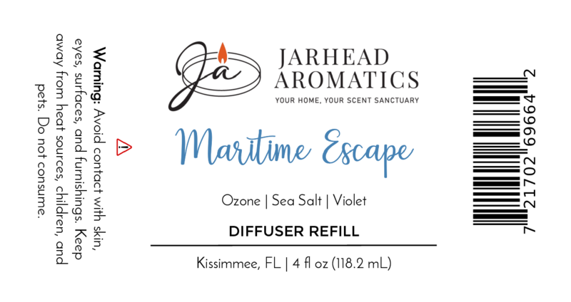The Jarhead Aromatics Maritime Escape Diffuser Refill label highlights Sea Salt, Ozone & Cedar notes. Barcode and warning to avoid contact are shown. Net weight is 4 fl oz (118.2 mL). Refresh your home with this marine-inspired fragrance oil refill.
