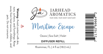 The Jarhead Aromatics Maritime Escape Diffuser Refill label highlights Sea Salt, Ozone & Cedar notes. Barcode and warning to avoid contact are shown. Net weight is 4 fl oz (118.2 mL). Refresh your home with this marine-inspired fragrance oil refill.