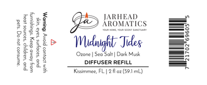 White product label for Jarhead Aromatics Midnight Tides Diffuser Refill, featuring a blend of Sea Salt, Dark Musk & Sandalwood. Includes warning, barcode. Size: 2 fl oz (59.1 mL). Based in Kissimmee, FL.