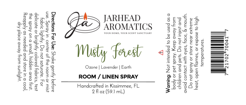 Label for Jarhead Aromatics Misty Forest Room & Linen Spray. Scent notes: moss, juniper, rainfall. Directions, warning, barcode included. Handcrafted in Kissimmee, FL. Elevate your home fragrance. 2 fl oz (59.1 mL).