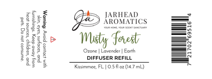 Label for Jarhead Aromatics Misty Forest Cold Air Diffuser Refill, scents: earthy woods & fresh rain. Avoid contact with skin/eyes. 0.5 fl oz (14.7 mL). Barcode on right.