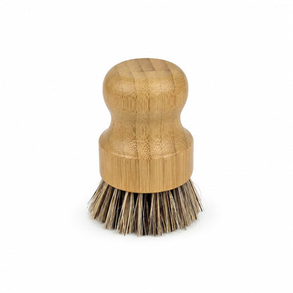 Introducing the Jarhead Aromatics Bamboo Handle Palm Fiber Palm Scrubber Brush—a natural, heavy-duty kitchen cleaning brush featuring an eco-friendly bamboo handle and stiff palm fiber bristles, displayed against a white background.