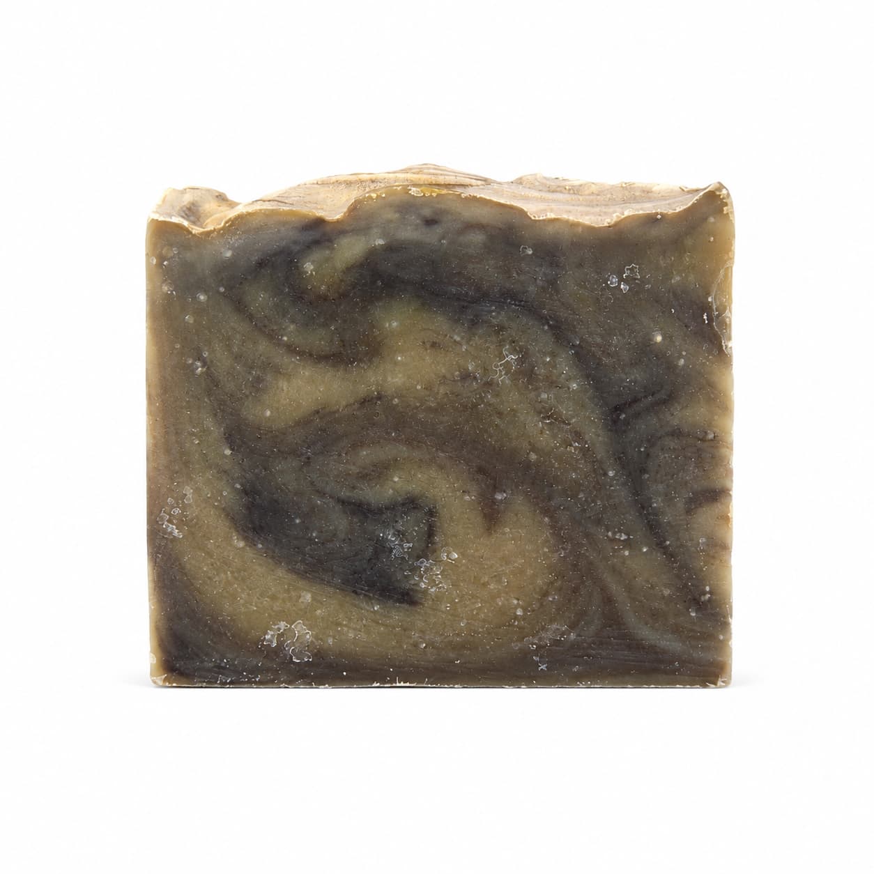 A handcrafted square bar of Jarhead Aromatics Palo Santo + Patchouli Handmade Artisan Soap, featuring a marbled swirl design in shades of brown, beige, and black charcoal, is displayed against a white background.