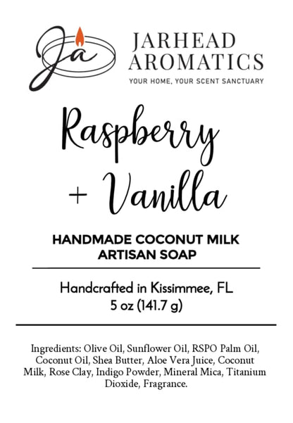 Product label for Jarhead Aromatics Raspberry + Vanilla Handmade Coconut Milk Artisan Soap | Fruity Berry & Vanilla Soap, handcrafted in Kissimmee, FL. Features a decorative logo at the top and a complete ingredient list. Experience the luxury of artisan soap with our Fruity Berry & Vanilla blend—crafted by Jarhead Aromatics for those who appreciate quality and craftsmanship.