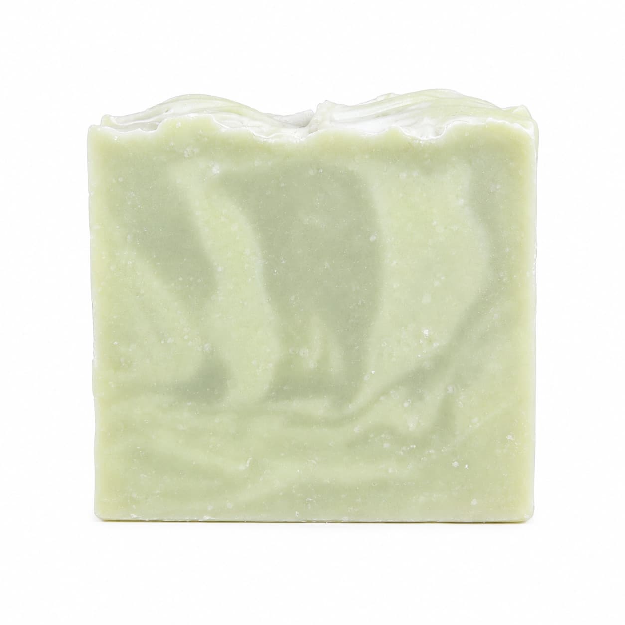 A rectangular, pale green bar of Jarhead Aromatics Sea Kelp + Aloe Handmade Natural Goat Milk Artisan Soap—with a slightly uneven top and a smooth, marbled surface—rests against a plain white background.