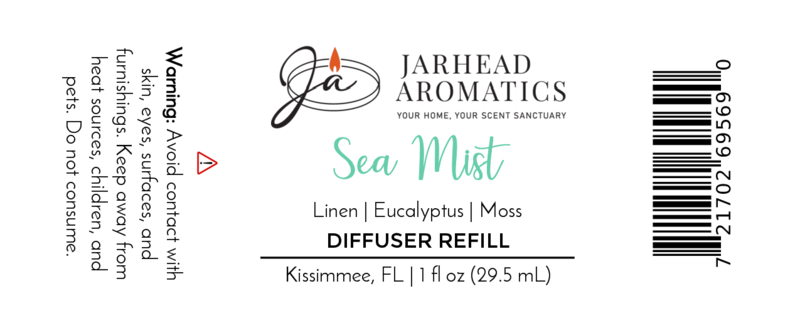 Sea Mist Car Diffuser Refill by Jarhead Aromatics | Clean Spa & Ocean Breeze scent with linen, eucalyptus & moss. Warning: Avoid skin/surface contact. Size: 1 fl oz (29.5 mL). Includes barcode & Kissimmee, FL info.