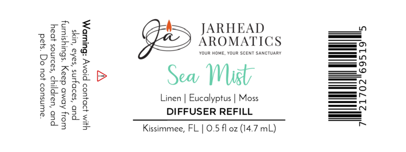Label for Jarhead Aromatics Sea Mist Cold Air Diffuser Refill—ocean breeze and linen scent with eucalyptus and moss. 0.5 fl oz luxury diffuser oil refill. Safety warning included. Kissimmee, FL. Barcode on right.