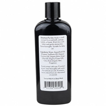 A black bottle of Summit Mist Handmade Body Wash by Jarhead Aromatics stands upright against a white background. The moisturizing body wash, formulated with organic aloe and plant-based oils, comes in a bottle with a flip-top cap and features a white label displaying directions for use, an ingredients list, and a barcode.