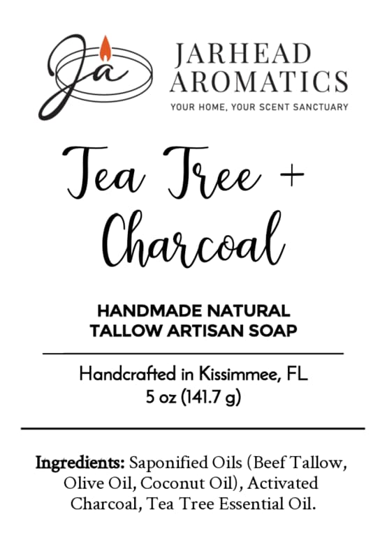 Jarhead Aromatics Tea Tree + Charcoal Handmade Natural Tallow Artisan Soap | Clarifying Tea Tree & Activated Charcoal Soap, 5 oz, handcrafted in Kissimmee, FL. This natural artisan soap label features black and orange text on a white background. Ingredients listed below.