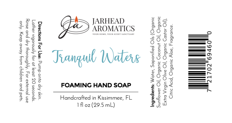 Jarhead Aromatics Tranquil Waters Foaming Hand Soap label: plant-based cleanser with organic oils, directions, ingredients, barcode, decorative text; white background with teal and black fonts; stylized JA logo at top.