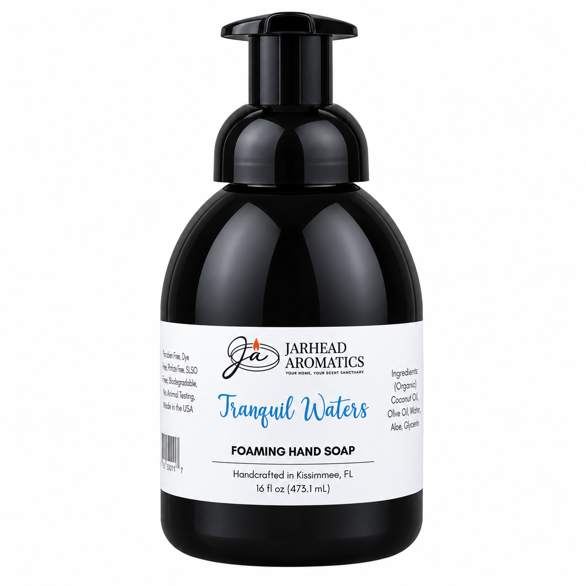 Black bottle of Tranquil Waters Handmade Foaming Hand Soap | Marine, Lily & Tonka Bean with a white label detailing the ingredients and Jarhead Aromatics company information.