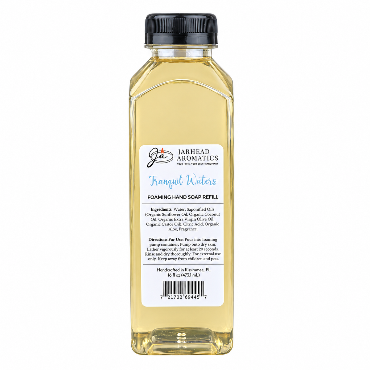 A clear plastic bottle of Tranquil Waters Handmade Foaming Hand Soap | Marine, Lily & Tonka Bean refill with a black cap and a rectangular label listing ingredients, directions, and a barcode.