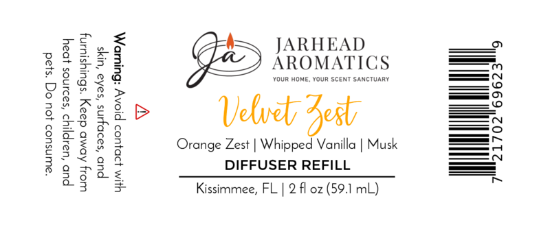 Jarhead Aromatics Velvet Zest Diffuser Refill | Citrus, Vanilla & Brown Sugar fragrance oil. Caution: avoid skin/surface contact. Net 2 fl oz (59.1 mL). Made in Kissimmee, FL. Includes barcode.