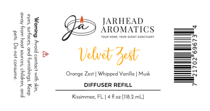 A label for the Velvet Zest Diffuser Refill by Jarhead Aromatics—a citrus, vanilla & brown sugar home fragrance oil. Warning: avoid contact with skin, eyes, surfaces; do not ingest. Size: 4 fl oz (118.2 mL).