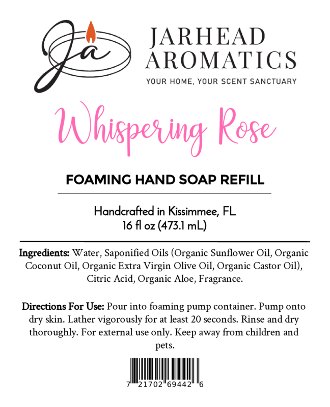 White label for Jarhead Aromatics Whispering Rose Foaming Hand Soap, 16 fl oz, with black and pink text. Includes a coastal fragrance with plant-based oils, ingredient list, usage directions, and barcode at the bottom.