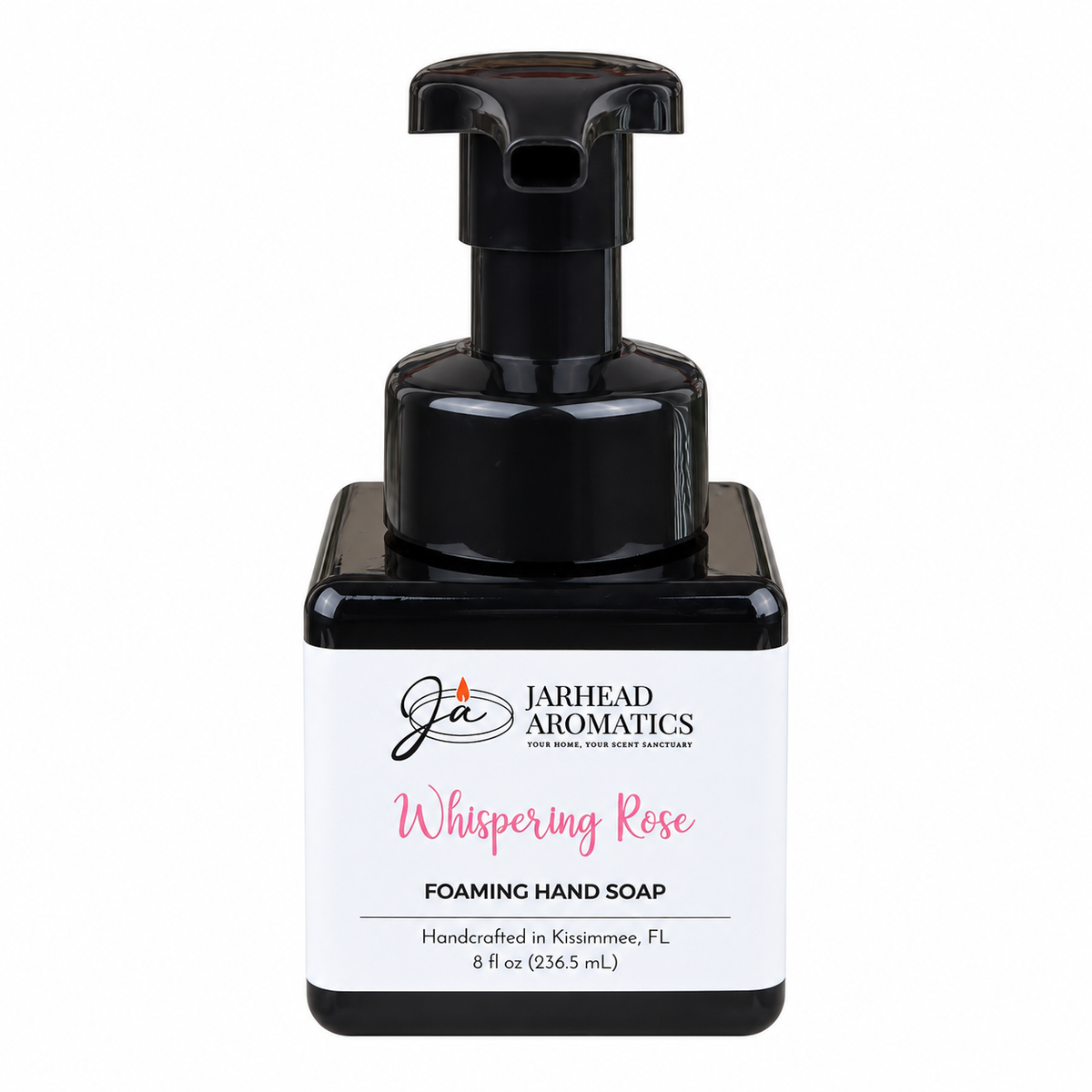 Square black bottle of Whispering Rose Handmade Foaming Hand Soap by Jarhead Aromatics, featuring a black pump dispenser and a white label with the brand name.