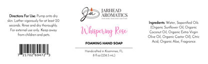 Jarhead Aromatics Whispering Rose Foaming Hand Soap label features a coastal scent, plant-based oils, usage directions, ingredients list, barcode, logo, and product info. Design uses mainly black text with pink accents.