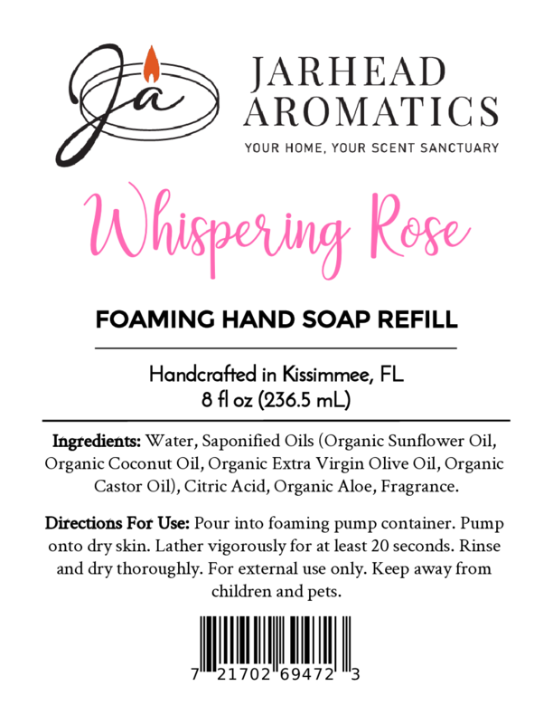 Label for Jarhead Aromatics Whispering Rose Foaming Hand Soap, 8 fl oz. Made with plant-based oils and coastal fragrance. Features ingredients, usage directions, barcode, and branding. Handcrafted in Kissimmee, FL.