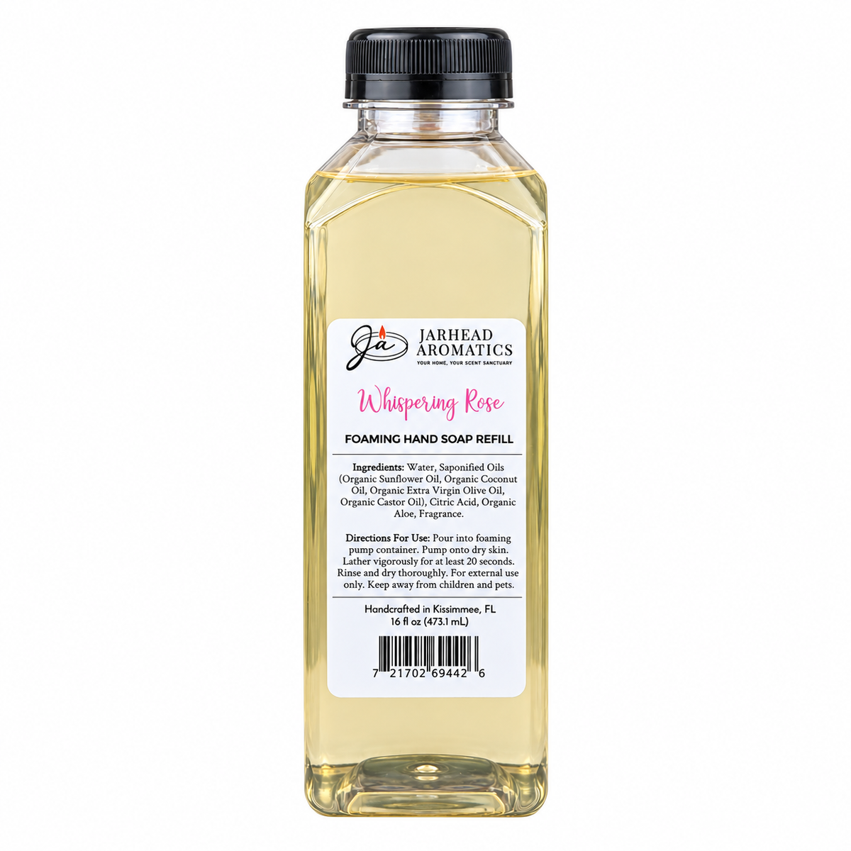 A clear plastic bottle of Jarhead Aromatics Whispering Rose Handmade Foaming Hand Soap refill with a black cap and a label detailing the ingredients, directions, and a barcode.